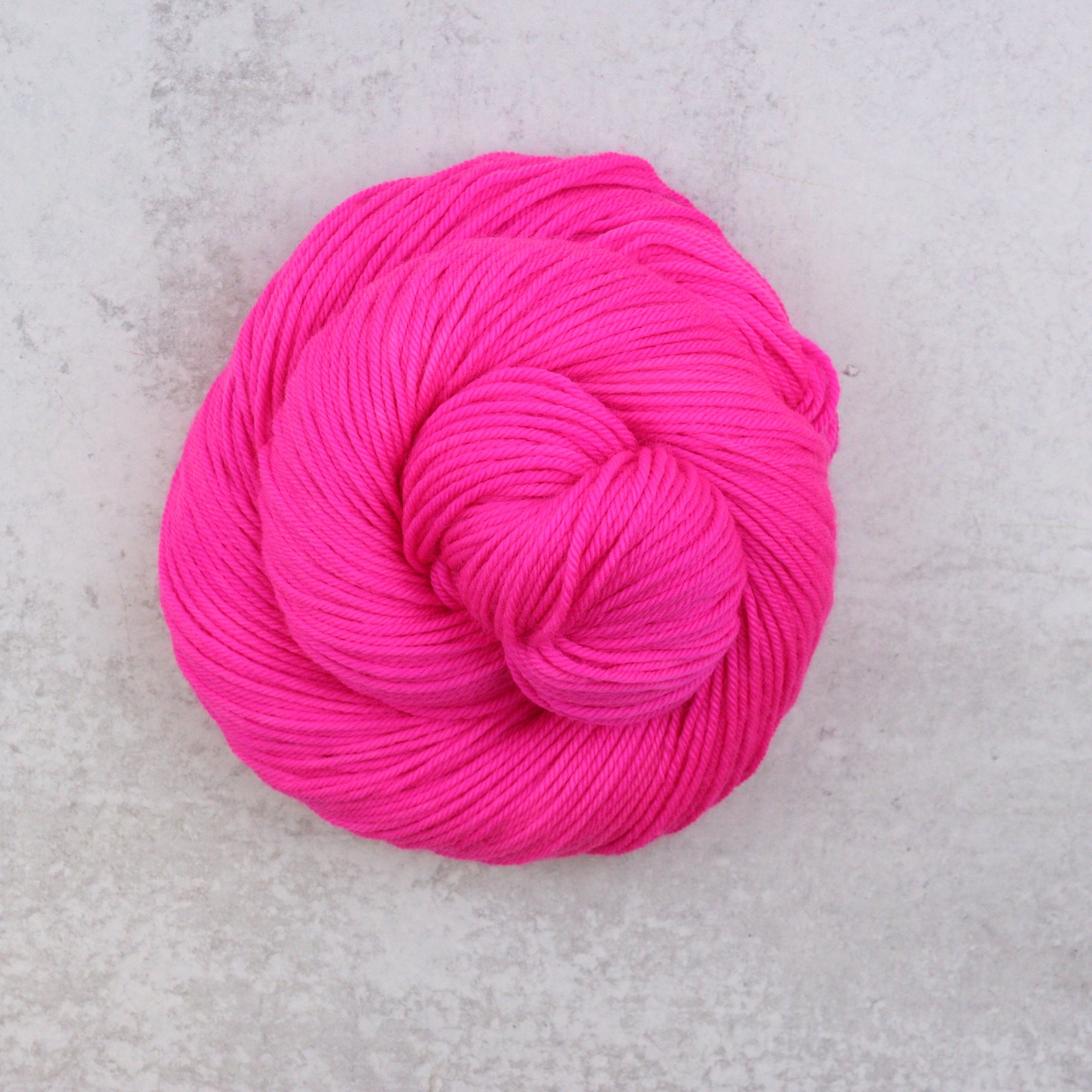 Neon Pink Hand-Dyed Superwash Merino DK Yarn | Spun Right Round